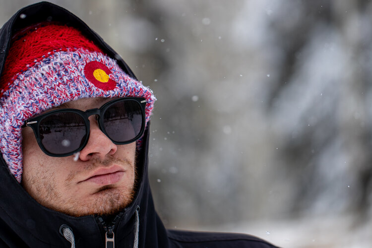 Man Wearing Colorado Hat in the Winter