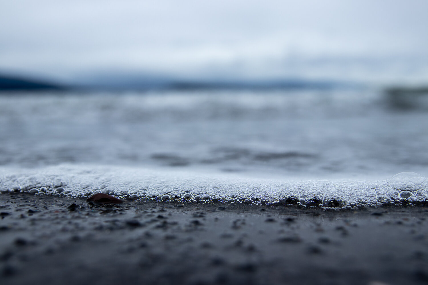 Close up view of the sea brushing the shore